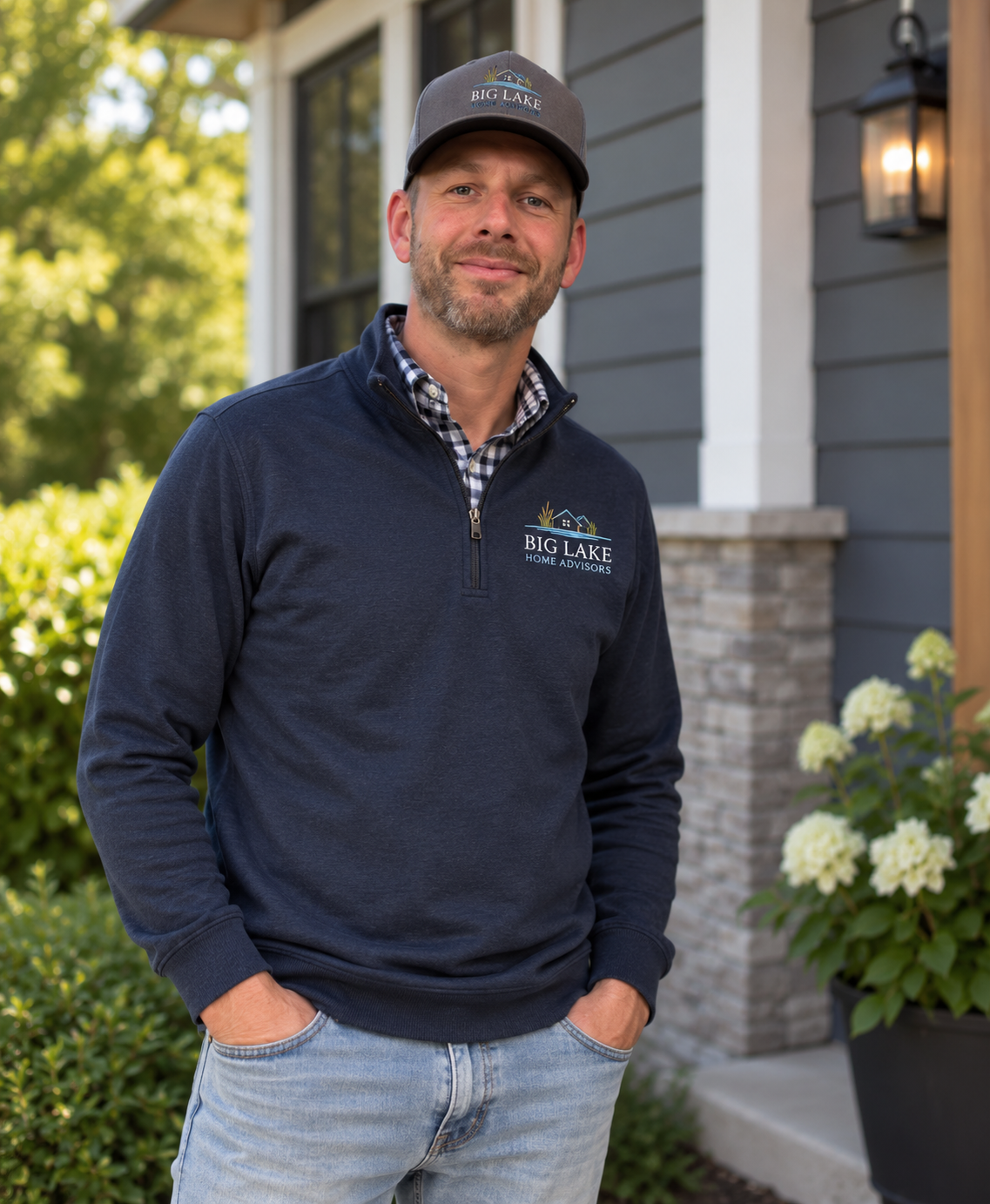 Neil, Big Lake Home Advisors, standing outside a home
